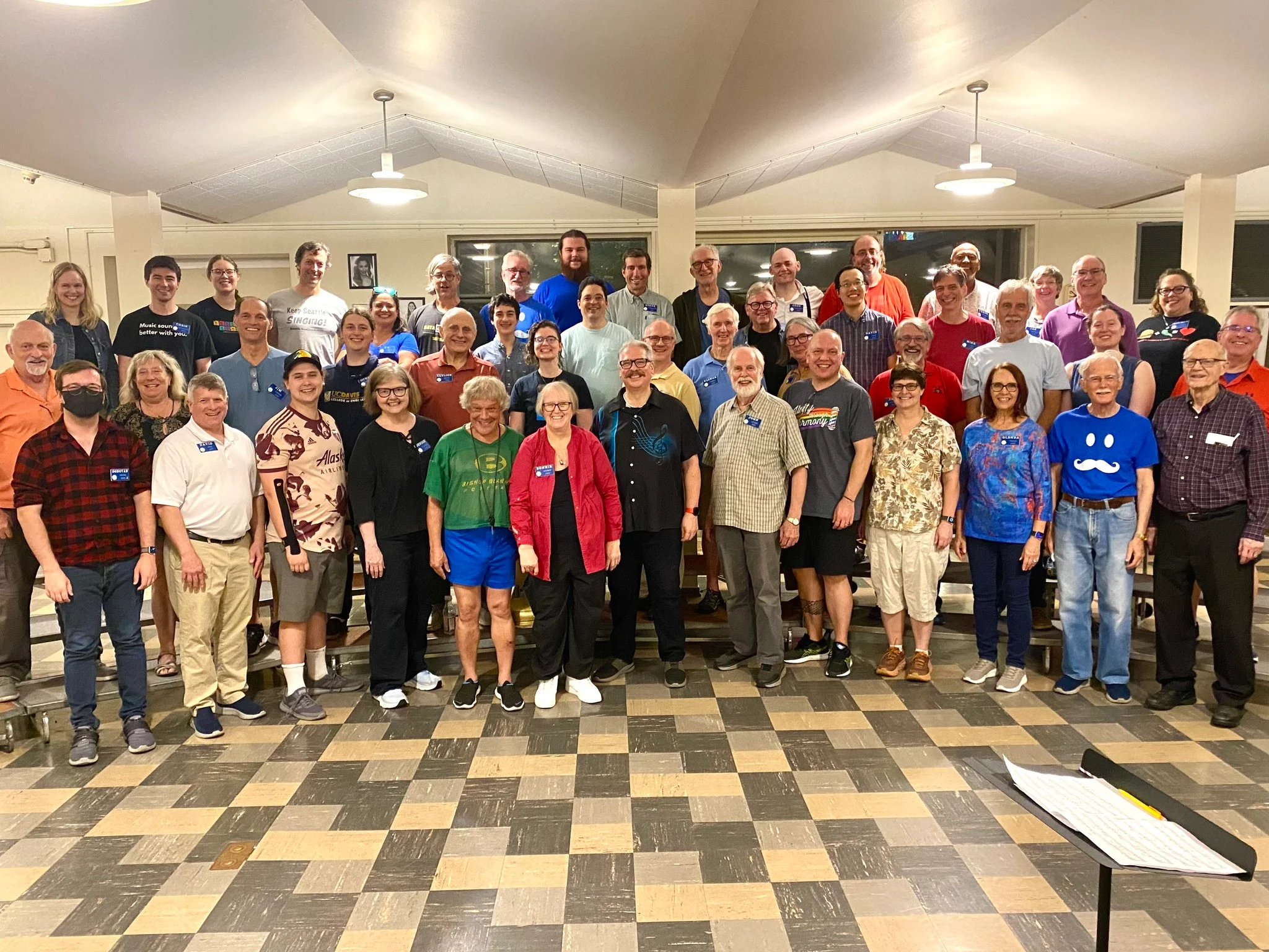 Community chorus group photo — ensemble coached by Ted Chamberlain