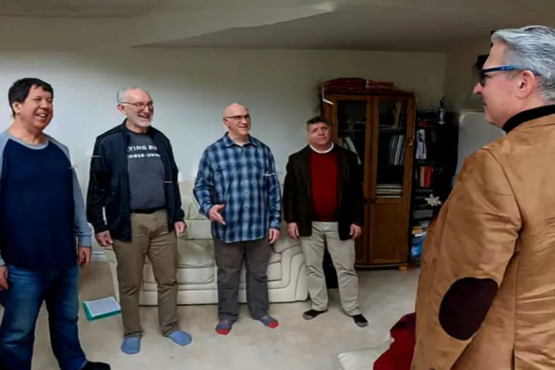 Ted coaching a barbershop quartet rehearsal